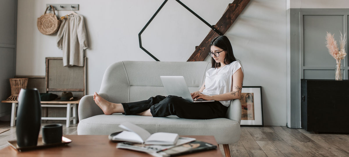 Woman working from laptop at home